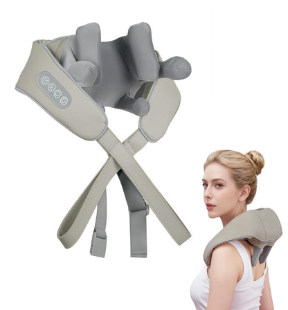 Woman wearing a shoulder and neck massager with heat therapy for upper back tension relief.