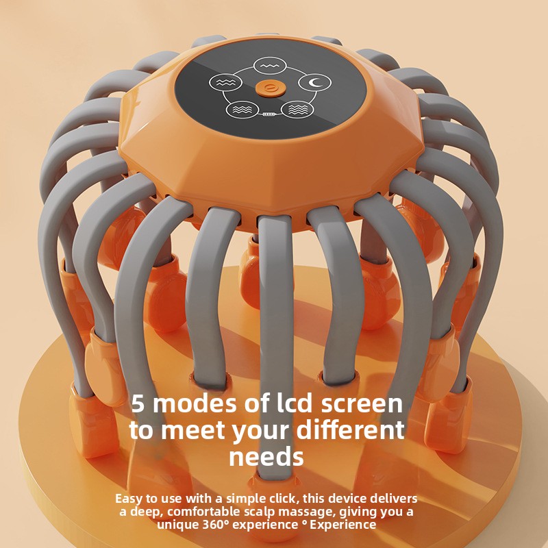 Orange and gray scalp massager with LCD screen on a beige background